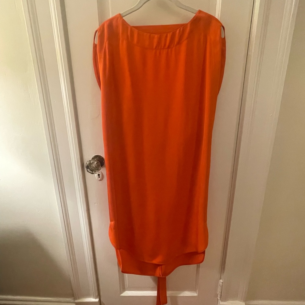 Orange midi dress. Fun tie/swoop in the back. Lee Mathews , size 1.